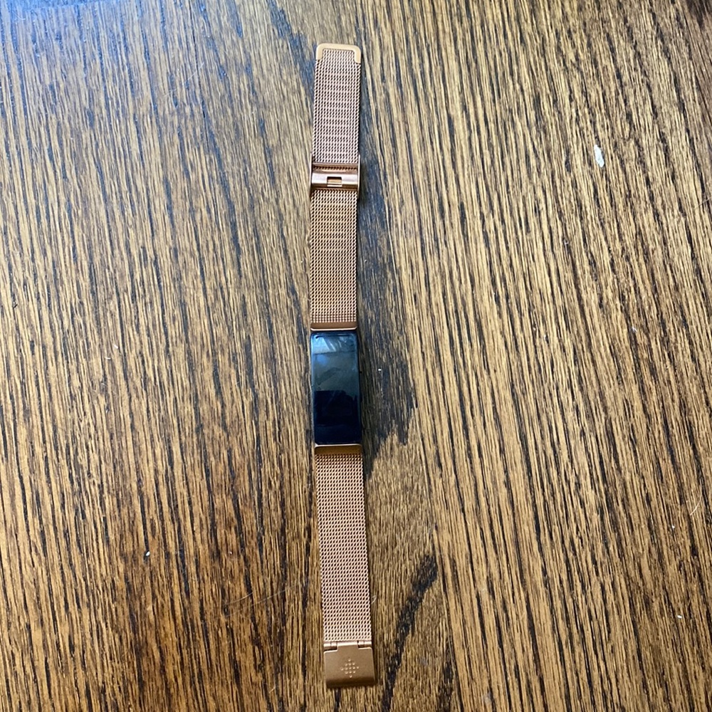 Fitbit with small rose gold bracelet